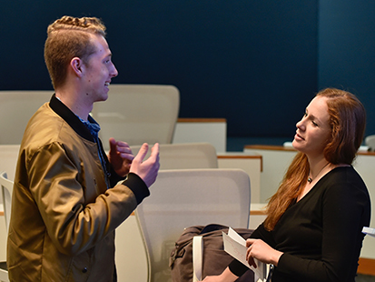 Drew Pilewski, who's studying radio-TV sports journalism at the Missouri School of Journalism, speaks with Melissa Gersin after the seminar. Photo: Nate Brown/RJI