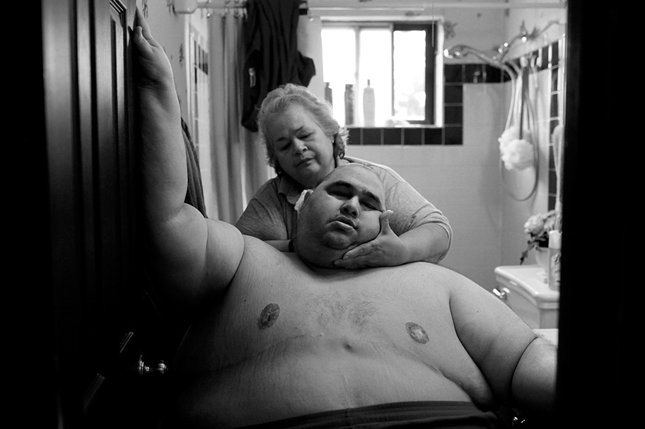 This first image of Hector Garcia Jr. and his mother giving him an improvised bath is so loving. Lisa's story about Garcia and his battle with obesity made this common struggle more human and nuanced. We see how hard he works, how much he is loved, how difficult the journey is. We fall in love with him, we root for him. We gain more empathy for his condition which is shared by many people in our community. Photo by Lisa Krantz