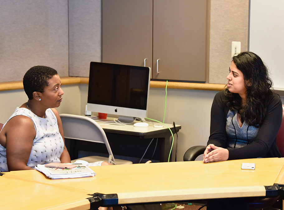Veda Shastri, right, speaks with Ebony Reed and took questions from Reed's Media Sales students. Photo: Nate Brown