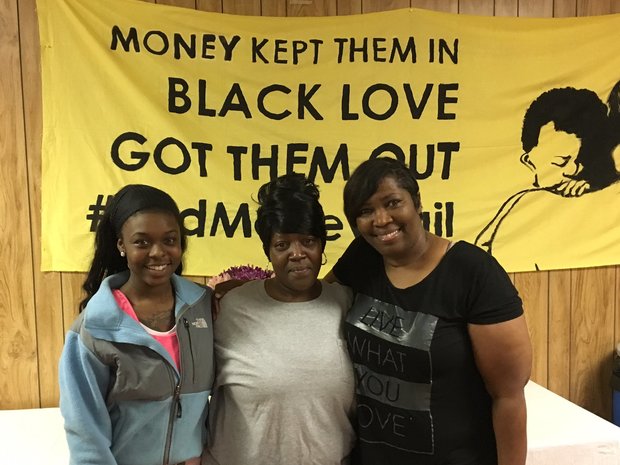 Freed mothers Coressia Davis, left, and Veronica Maiden, center, pose with Birmingham Black Lives Matter chapter co-founder Cara McClure. (Photo: Connor Sheets | csheets@al.com)