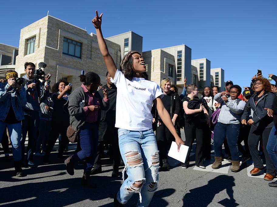 Ayanna Poole, an original member of Concerned Student 1950, stops to sing during the “We're Not Afraid” march at the University of Missouri, Nov. 13, 2015. Photo: Ellise Verheyen | Columbia Missourian