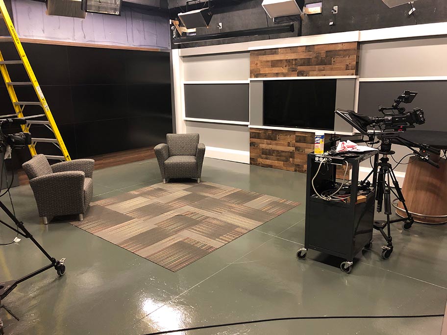 The new set takes up all but 10 percent of the studio’s available wall space and includes a large video wall on the west wall and a 65” inch TV on the north wall | Click to enlarge