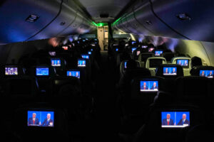 FLIGHT OVER THE U.S. - OCTOBER 22: The final presidential debate between President Donald Trump and Democratic nominee Joe Biden appears on screens during a flight from Detroit on Thursday, Oct. 22, 2020. (Salwan Georges / The Washington Post)