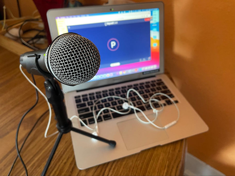 Podcasting microphone and laptop