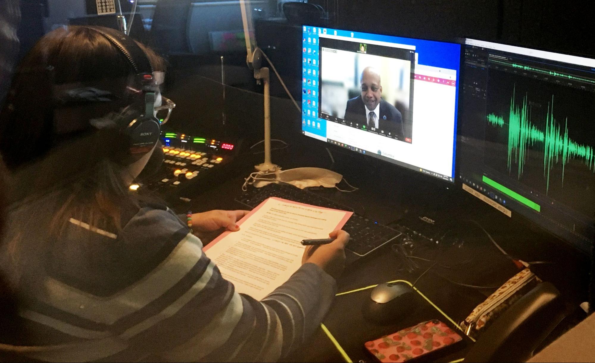 Xcaret Nuñez works in the KBIA whisper room inside the newly converged newsroom at MU. Photo: Ryan Famuliner