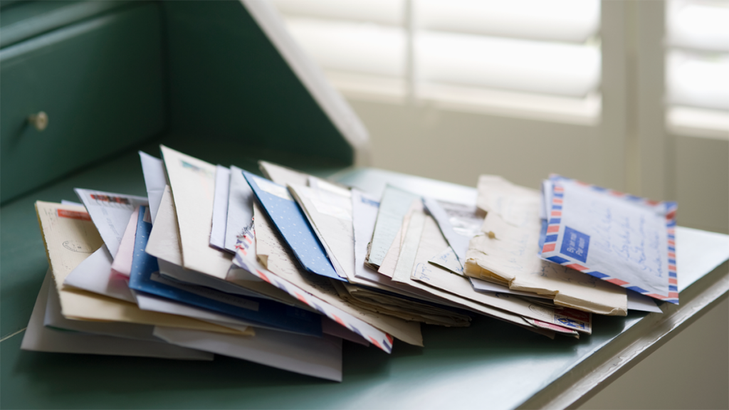 Stack of mail on a desk