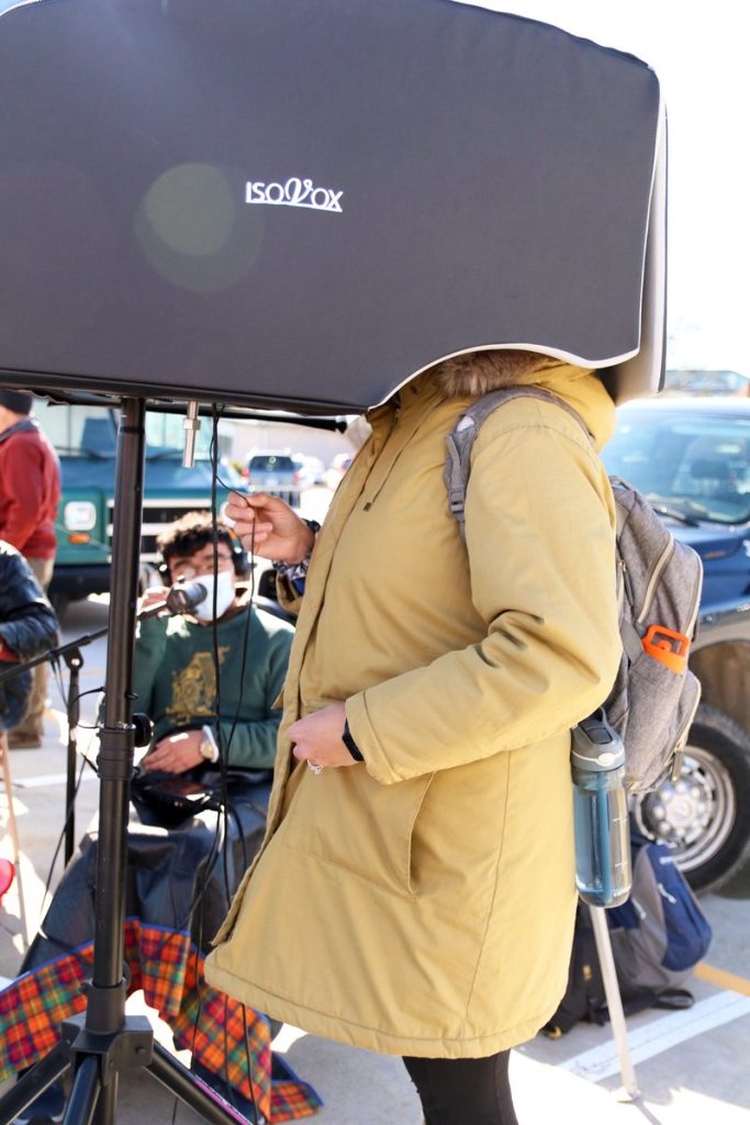 Missouri On Mic producer Tadeo Ruiz conducts an interview on site for a pop-up production event at the Columbia's Farmers Market, April 9, 2022.