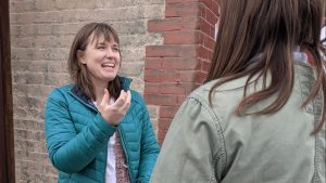 Nora Hertel, left, founder ofThe Optimist, talks with fellow journalist Jenny Berg in St. Cloud, Minnesota, in November 2022. Photo: Sarah Kocher