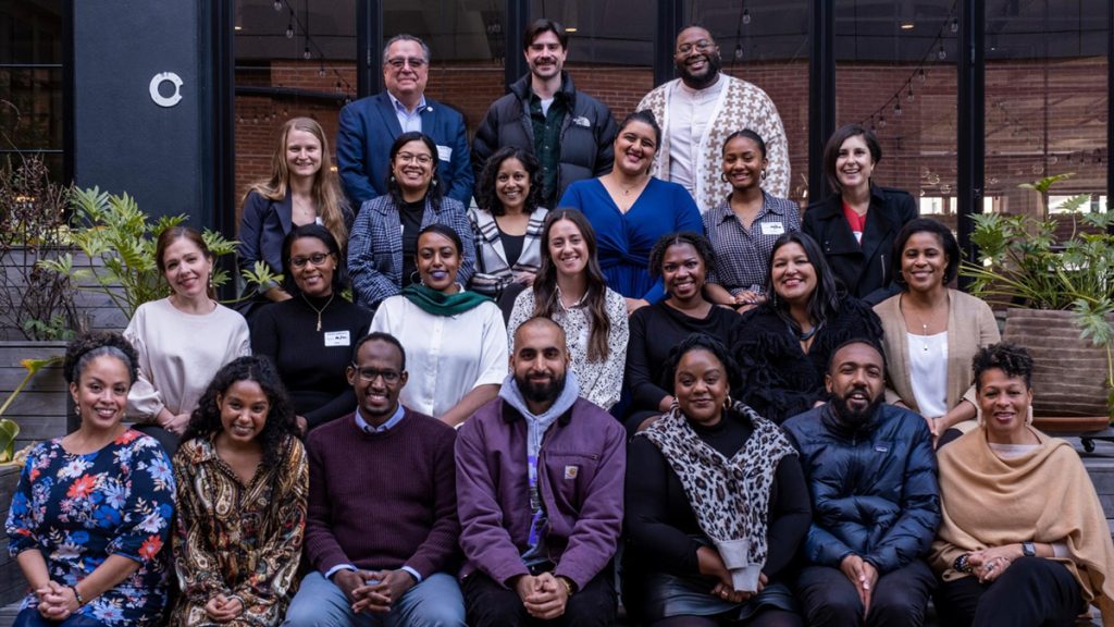 (Back row left to right) Levi Rickert, Daniel Laplaza, Da’Shaun Harrison. (Second row left to right) Emily Daly, Maria Hernandez, Melanie Figueiredo, Sonali Kohli, Rae’Mah Henderson, Valeria Fernandez. (Third row left to right) Leonor Ayala Polley, Ashton Lattimore, Ariam Alula, Janelle Zagala, Andaiye Taylor, Mitra Kalita, Ellah Nze. (Front row left to right) Ashanti Martin, Arya Royal, Mukhtar M. Ibrahim, Tareq Alani, Candice Fortman, Mazin Sidahmed, Sara Lomax. Photo: Hari Adivarekar