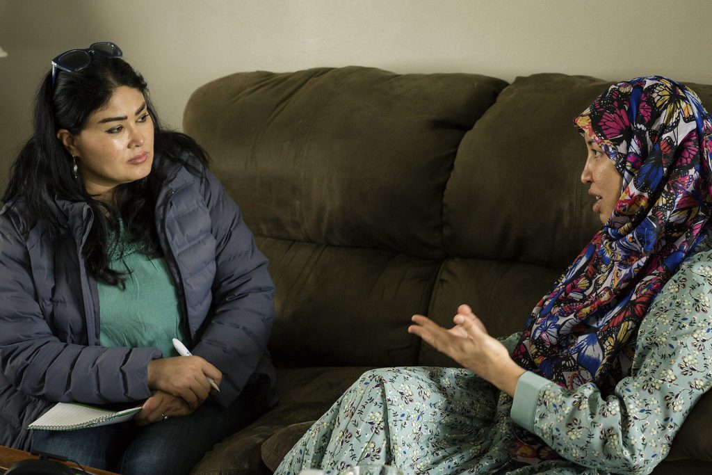 Borderless Reporting Fellow Saleha Soadat interviews former Afghan district governor Salima Mazari in her current home in the American Midwest, May 4, 2022. Photo: Michelle Kanaar | Borderless Magazine