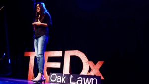 Upasna Gautam delivering her Ted Talk at TedxOakLawn.