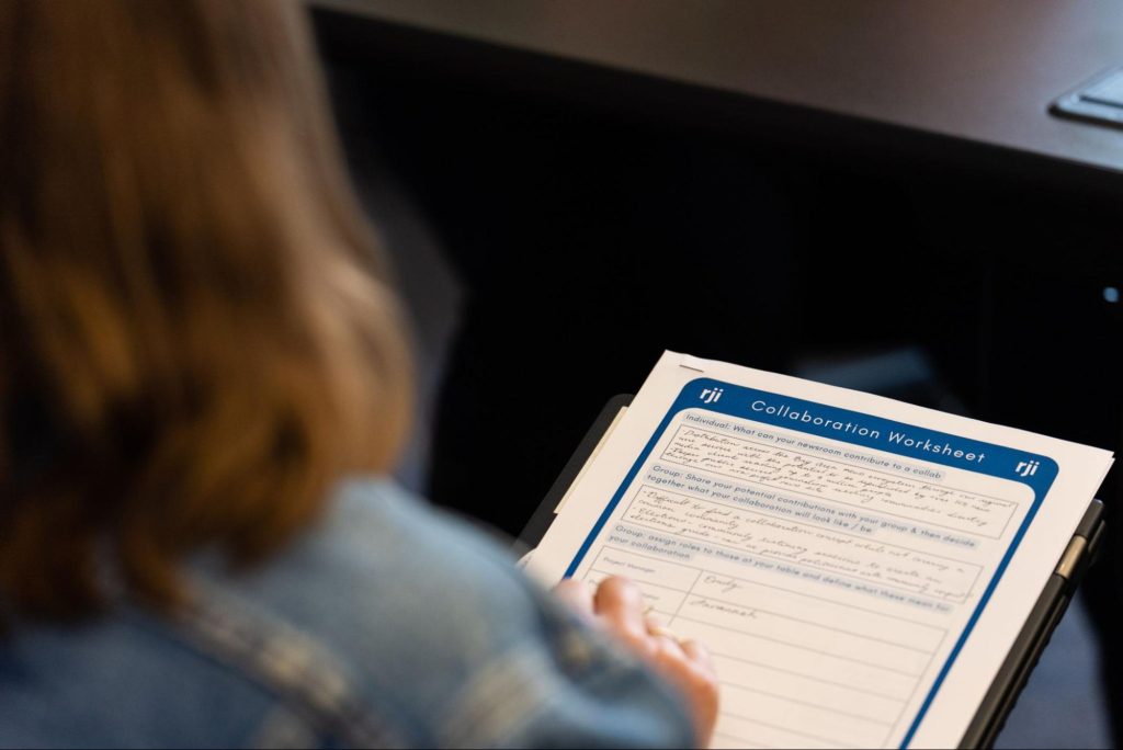 A CJS attendee works with their group on the collaboration worksheet during the INN & RJI workshop. Photo: Will Allen-DuPraw