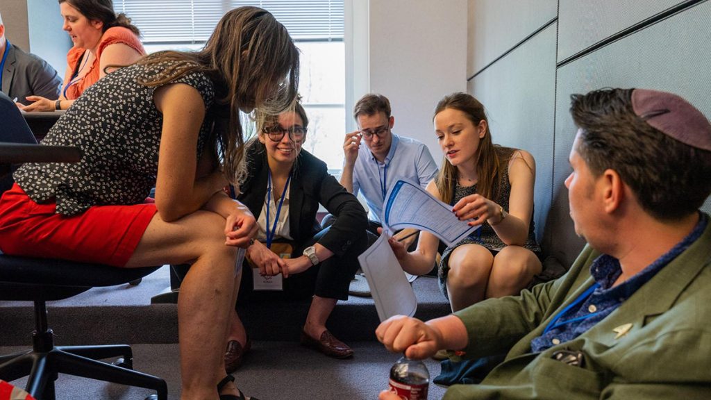 Attendees work together at the Collaborative Journalism Summit during the RJI & INN workshop: Expand your impact and resources. Photo: Will Allen-DuPraw