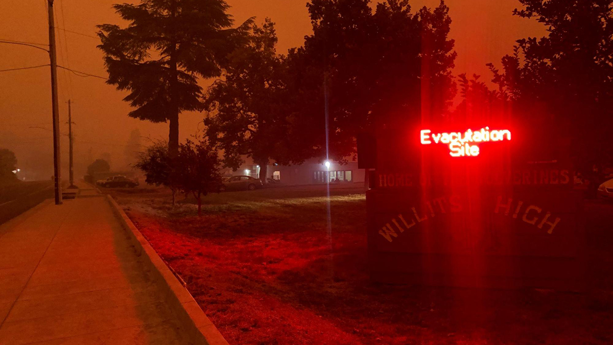 Late afternoon outside an evacuation center set up at Willits High School during the Oak Fire on Sept. 9, 2020.