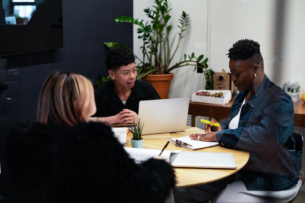 A group of co-workers of various genders having a meeting. Image: Broadly’s Gender Spectrum Collection