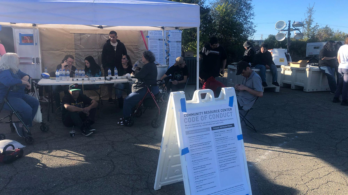 Mendocino County residents gather in Ukiah to charge their phones and connect to wifi at a community resource center set up by PG&E during a week long blackout during October 2019 | Photo: Kate B. Maxwell