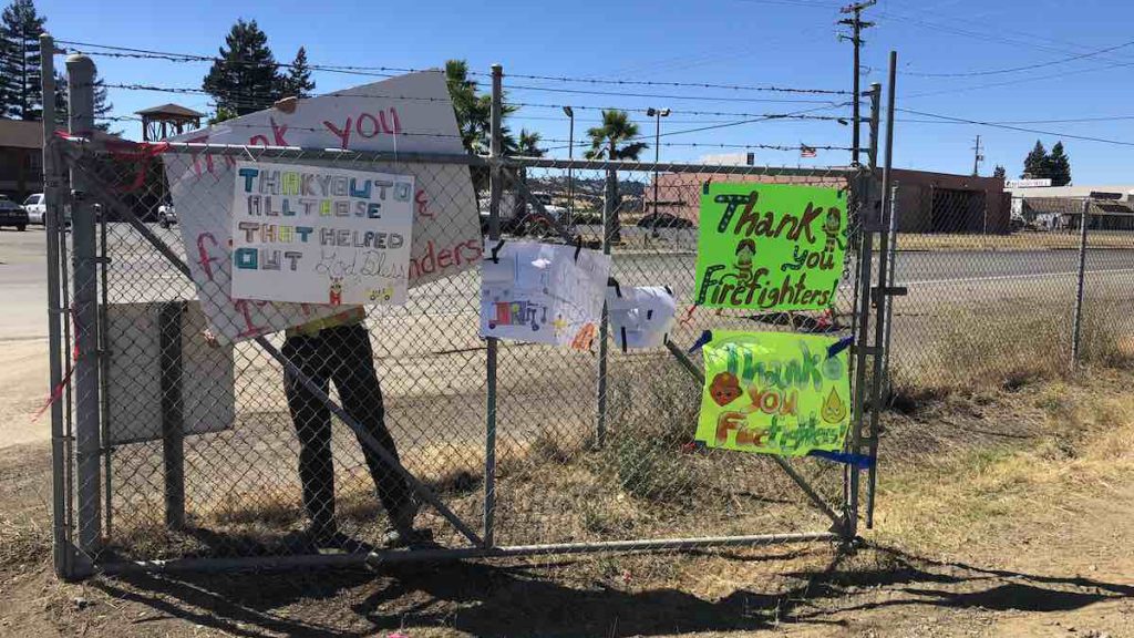Community signs thanking firefighters outside the Mendocino Complex Fire Incident Command in Ukiah, CA. Photo: Kate Maxwell