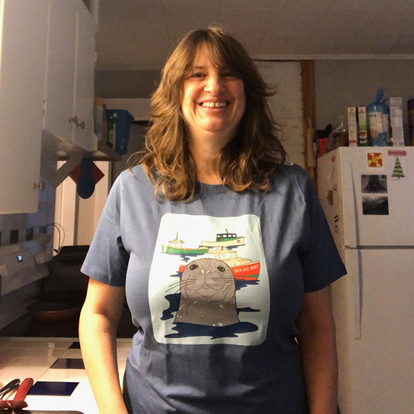 Saco Bay News Publisher Liz Gotthelf wearing her first T-Shirt sample.