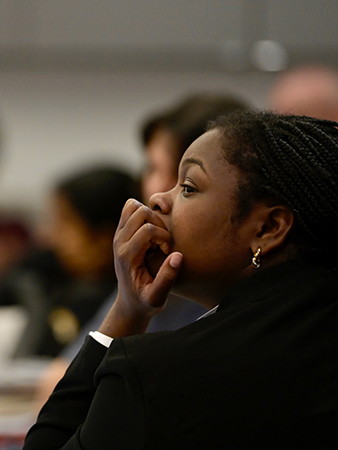 Ashley Flewellen, first-year graduate student, attending the panel discussion