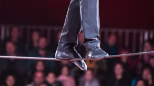 Close up of the feet of a high-wire walker. Photo: Deyan Geogiev | Canva