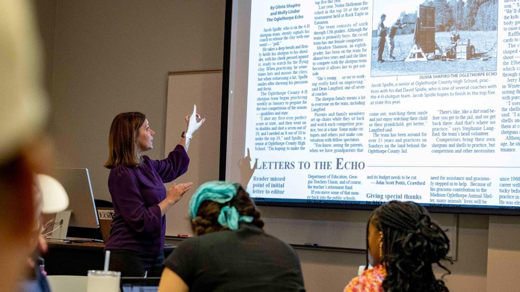 Dr. Amanda Bright leads a class discussion in a student capstone class in which students produce content for the Oglethorpe Echo, a local newspaper. Photo: Dorothy Kozlowski | University of Georgia Marketing and Communications