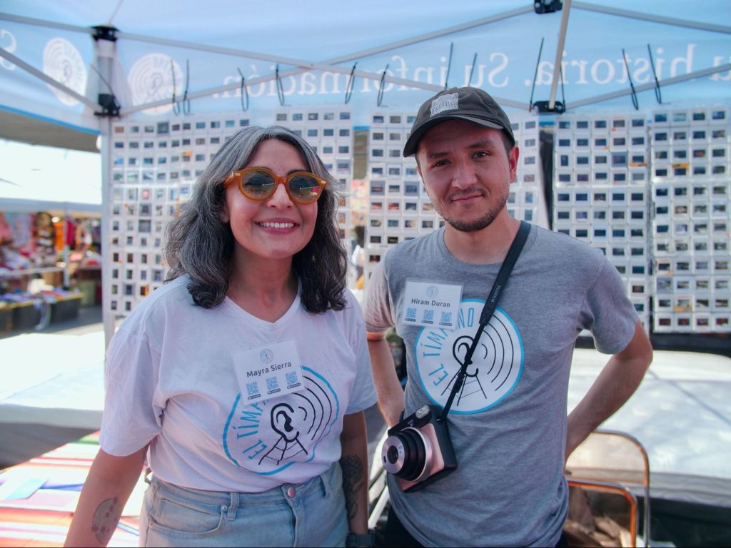 El Tímpano Special Projects Manager Mayra Sierra and photojournalist Hiram Alejandro Durán designed a pop-up storytelling booth to capture over 75 stories from patrons of La Pulga in Oakland, Calif. The booth allowed El Tímpano to engage face-to-face with community members and highlight an institution that reflects the diversity of the Bay Area. Photo: Katherine Nagasawa | El Tímpano 