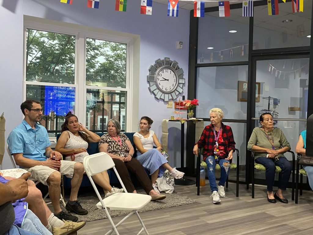 Cristal Sanchez, center, at an event at the Latin American Community Center where the purpose was to speak about local community issues. Photo Courtesy of the Latin American Community Center.