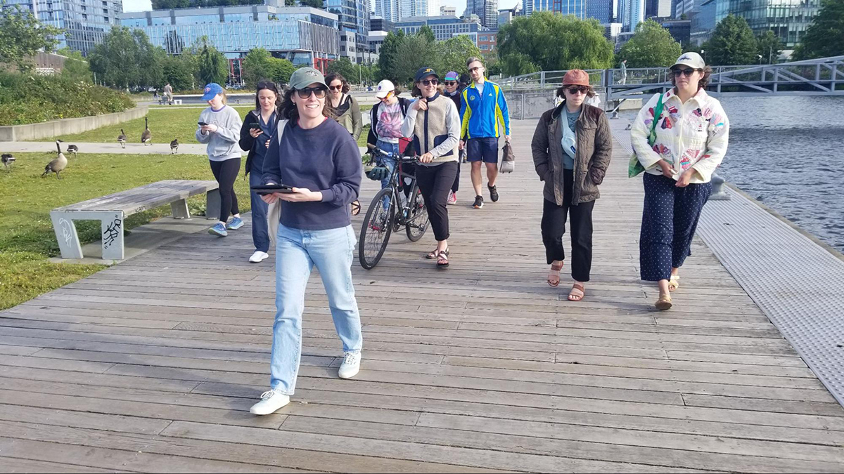 Future Tides Founder & Editor Cara Kuhlman leads a free walking tour along the Seattle waterfront June 12, 2024. Photo: Guillaume Wiatr