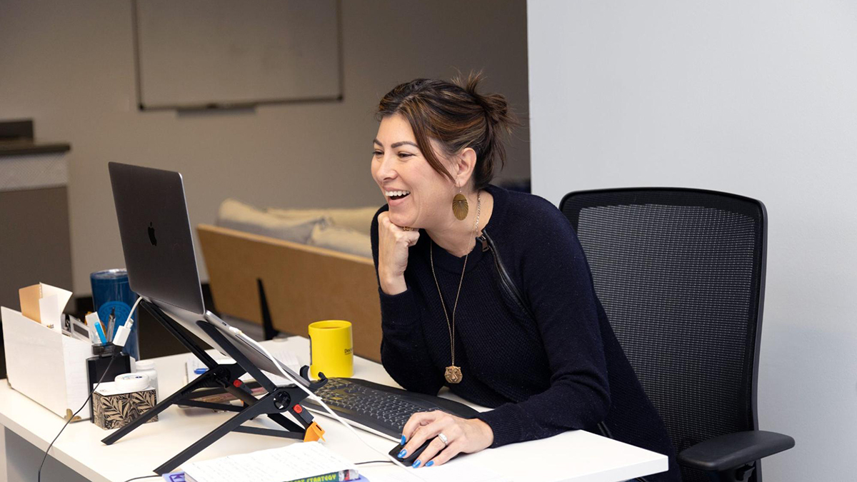 Sarah Alvarez at her desk at Outlier Media.