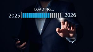 Man swipes progress bar loading 2025 into 2026.