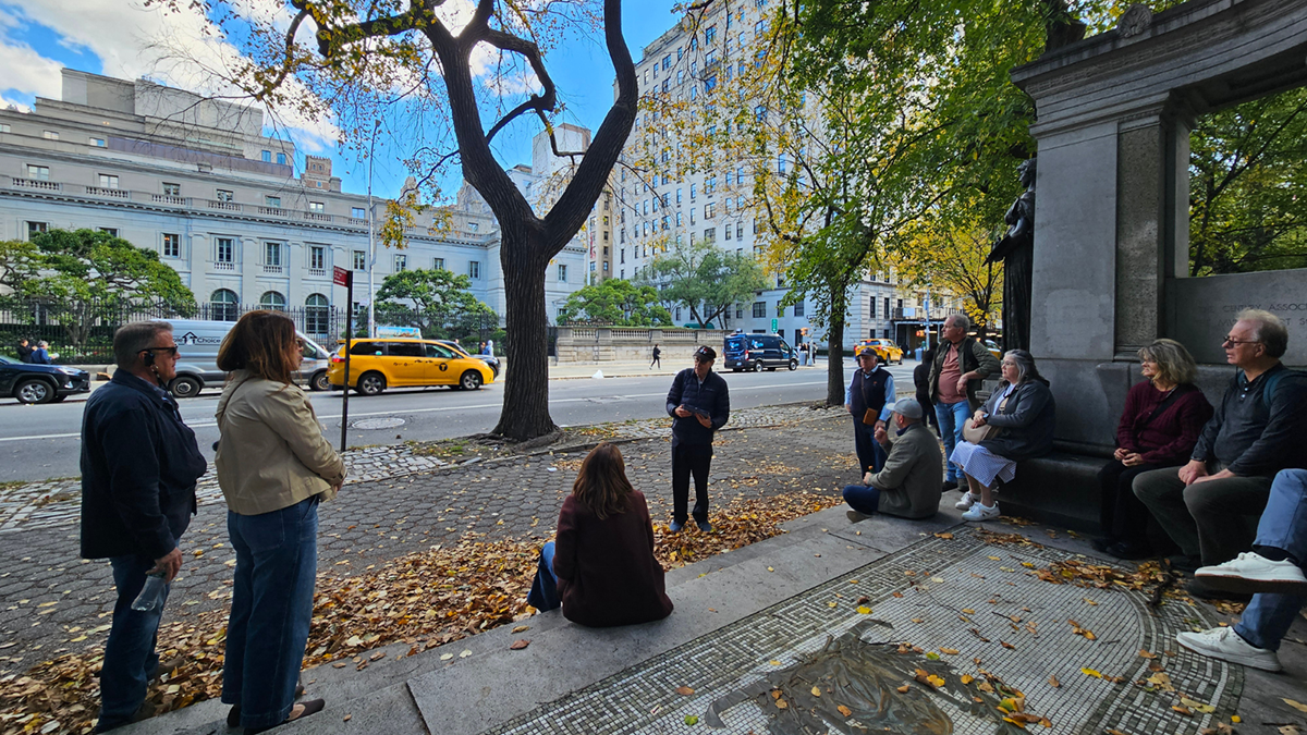 Guests listen to an Untapped New York tour guide on a sunny October day. Photo: Cara Kuhlman