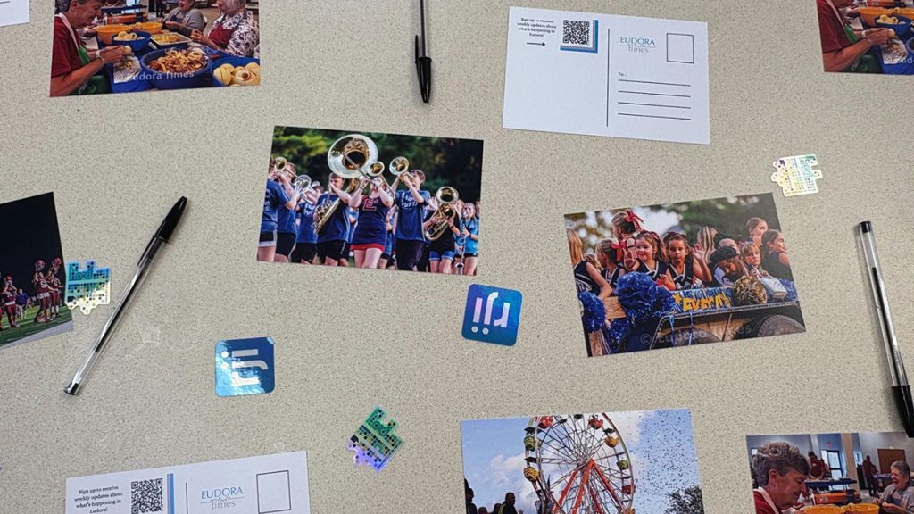 The Innovation in Focus team distributed five different postcards showing Eudora community life at a photo gallery event on March 23.