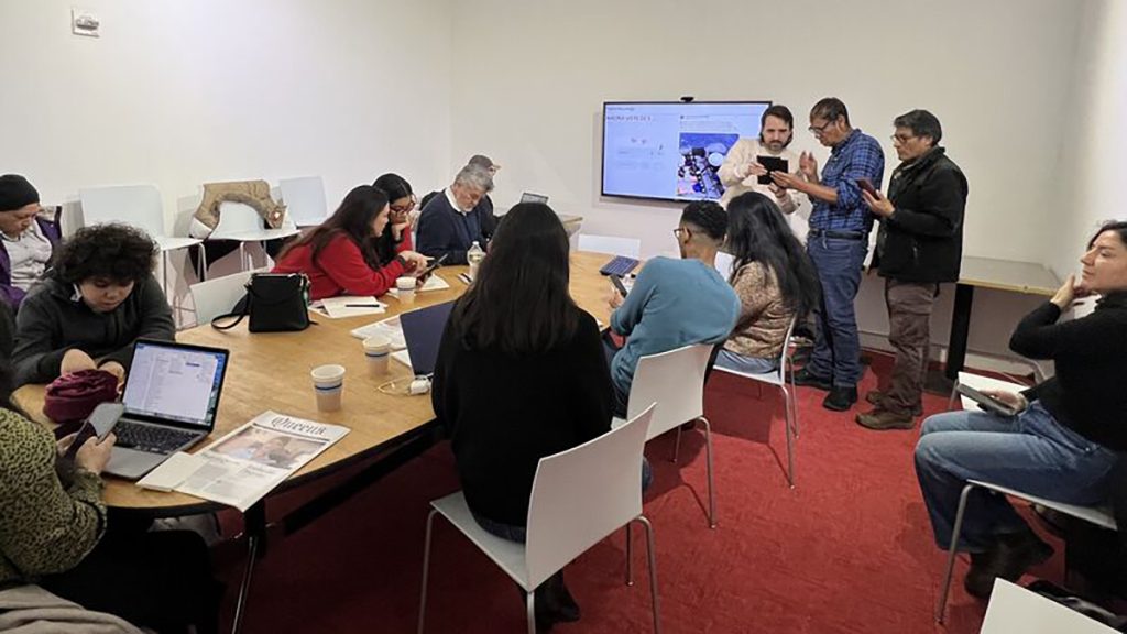 A group of people gathered in a conference room