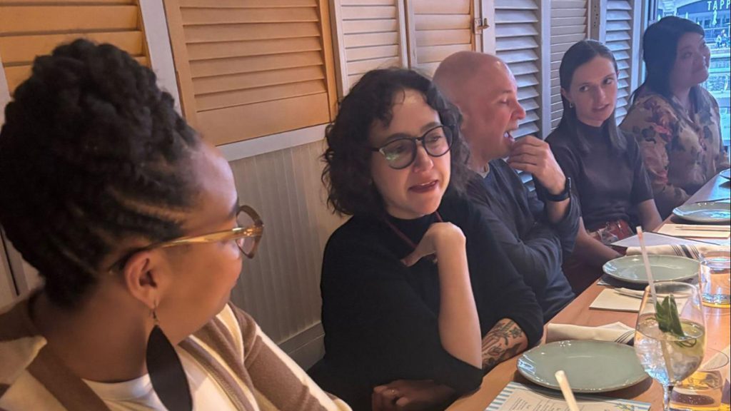 People gathered around a dinner table