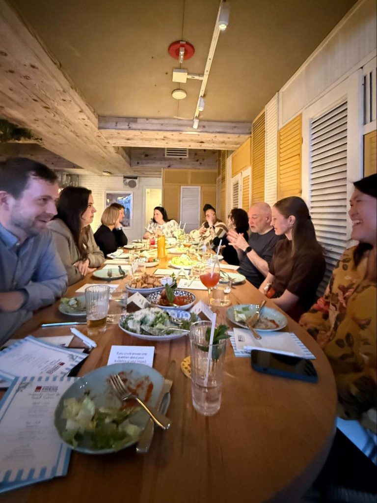 People gathered around a dinner table