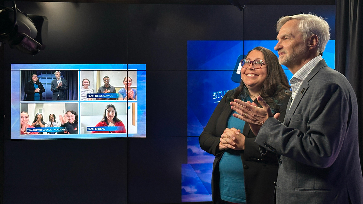 Randy Picht [right] and Kat Duncan announce the winners of the 2026 RJI Student Innovation Competittion