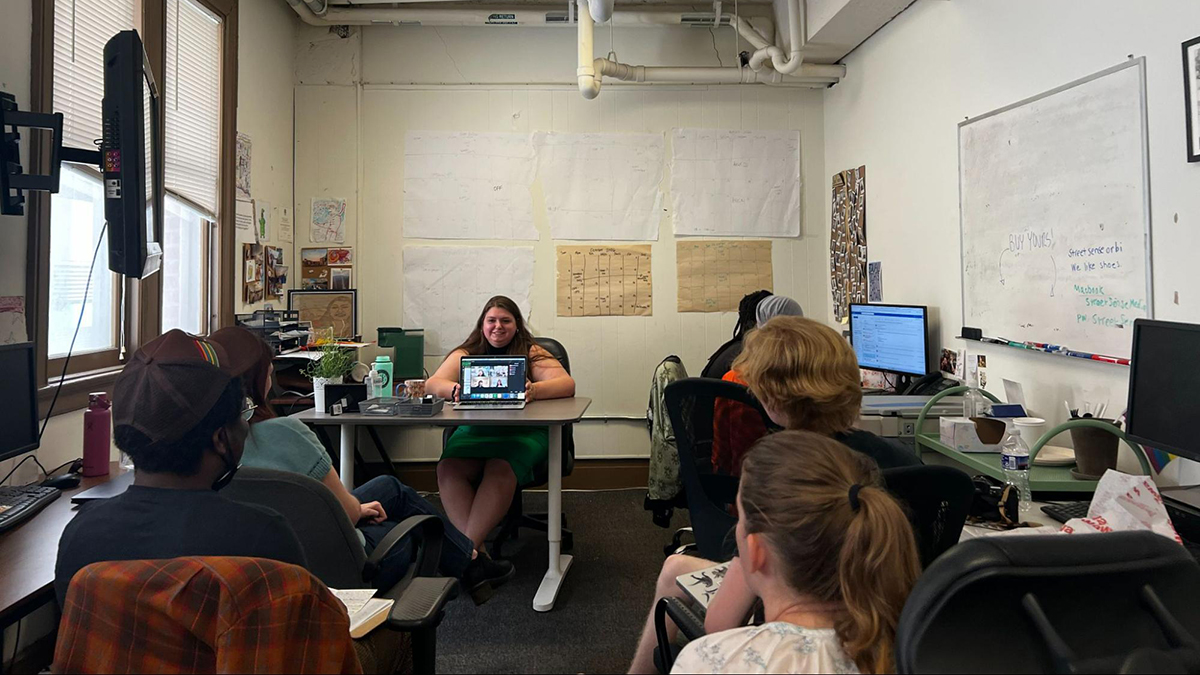 Editor-in-Chief Annemarie Cuccia leads a meeting with interns at Street Sense Media’s headquarters in D.C. Photo: Madi Koesler | Street Sense Media